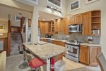 Fully Equipped Upgraded Kitchen with Island and Additional Seating